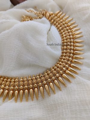 Mullamottu necklace looks very simple and elegant. Necklace - Length 40.64 cms, gold polish.