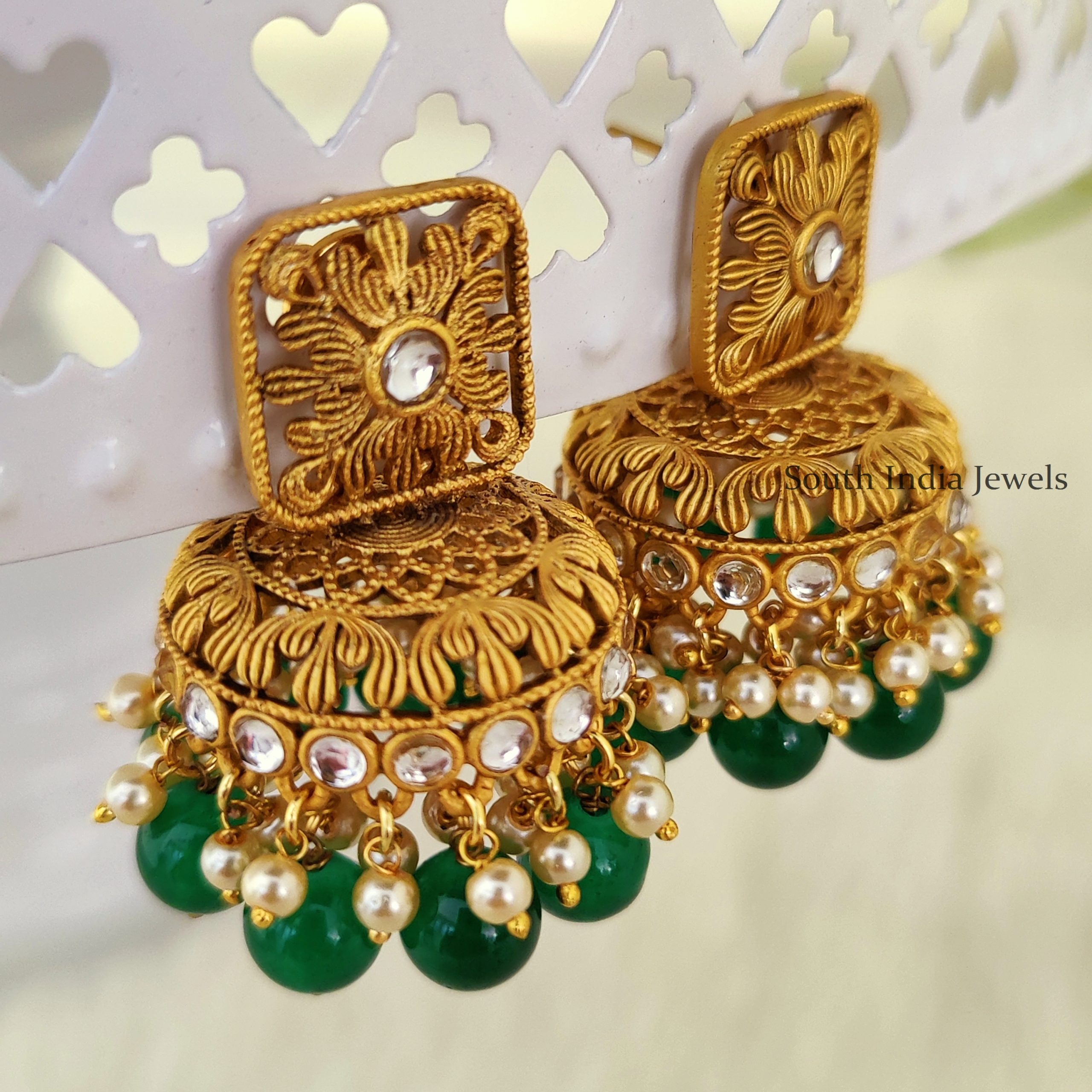 Saraf RS Jewellery earringscontemporary  Buy Saraf RS Jewellery Rose Gold  Plated White Ad Studded Bell Shaped Party Wear Jhumka Online  Nykaa Fashion