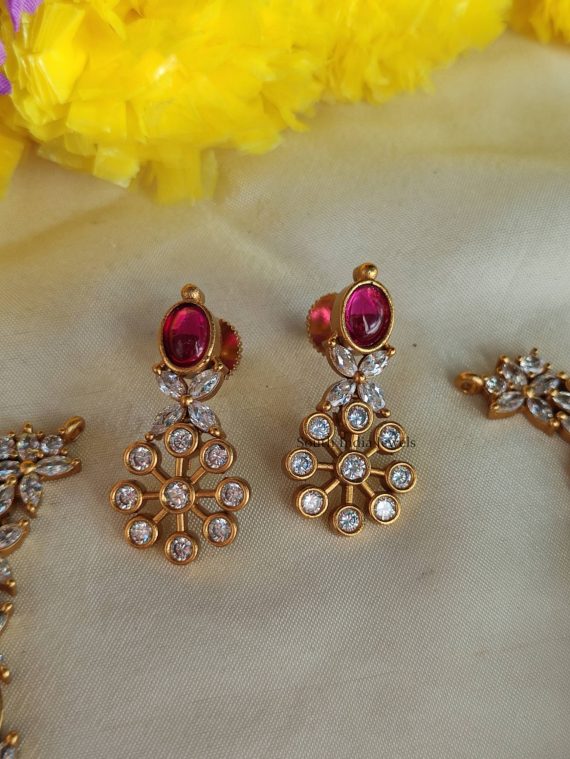 Adorable narvarathna stones studded design necklace with earrings.