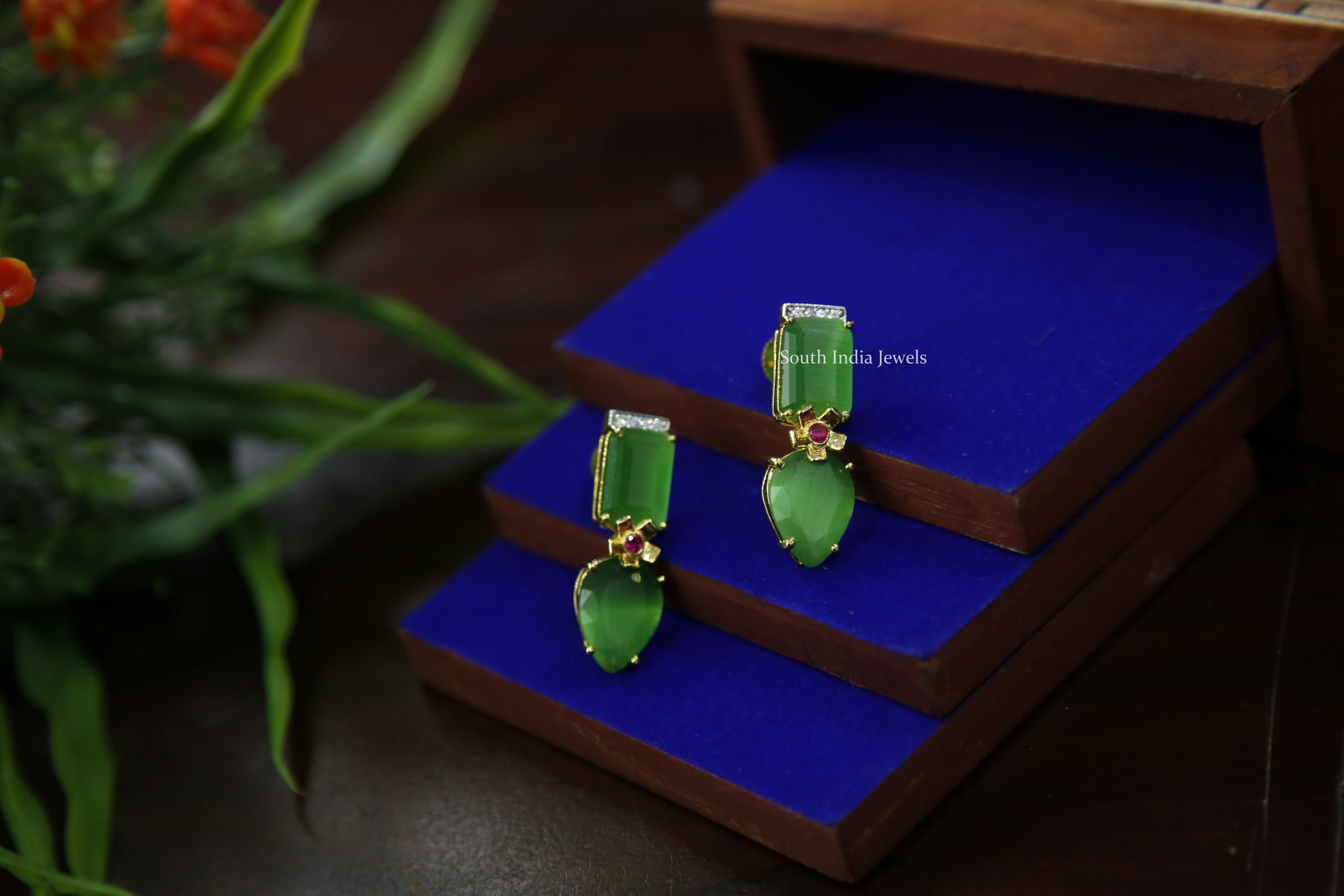 Gold Finish Light Green Stone Stud Earrings Design by Just Jewellery at  Pernias Pop Up Shop 2023
