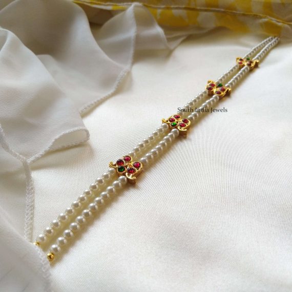 Elegant kemp bead pearl design necklace with no earrings . This will be your new favorite to style with sarees. Also shop more Kemp Bead Pearl Necklace at South India Jewels.