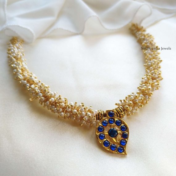 This will be your new favorite to style with sarees. Also shop more Kemp Mango Pendent Necklace at South India Jewels.