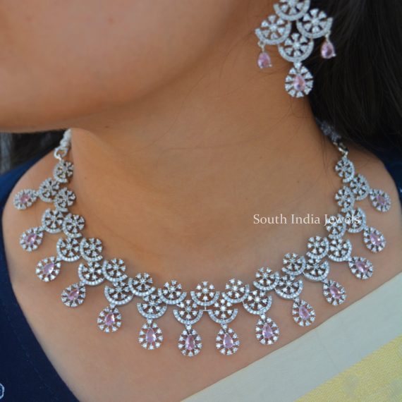 Gorgeous Pale Pink Rodium Polish Necklace. This is a beautiful necklace suitable for all kinds of attires. Shop more Gorgeous Pale Pink Rodium Polish Necklace at South India Jewels.