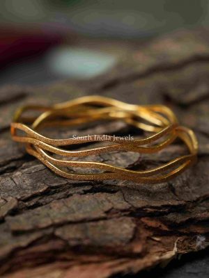 Stunning Gold Tone Bangle