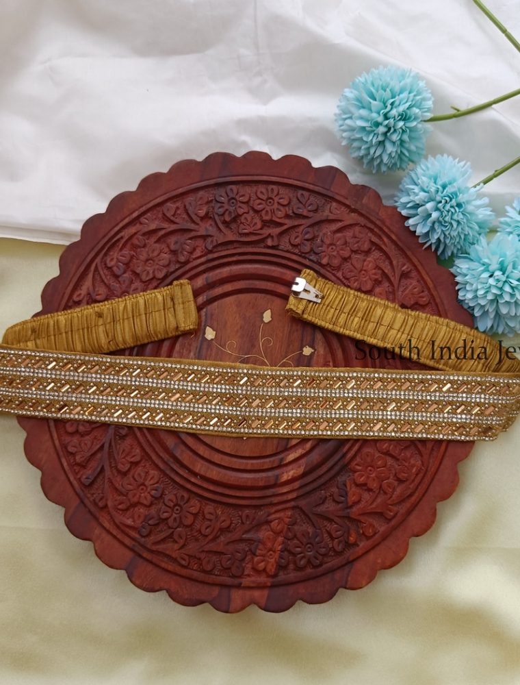 "Details & Specifications: Materials used: Cloth finish elastic(including stones) Weight –30 gms Length –40 cm(Adjustable for Every Size)"