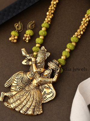 Classy Krishna Designed Pendant In Antique Gold Plated Green Necklace Set With Ghunghroos
