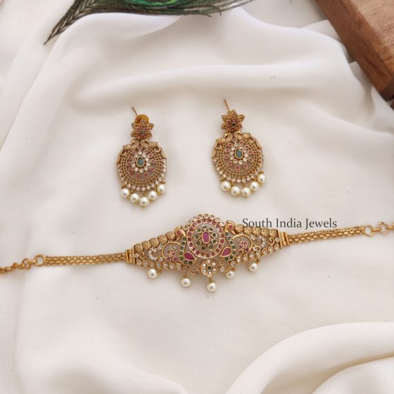 Exquisite and alluring Gold Plated Peacock AD Choker.