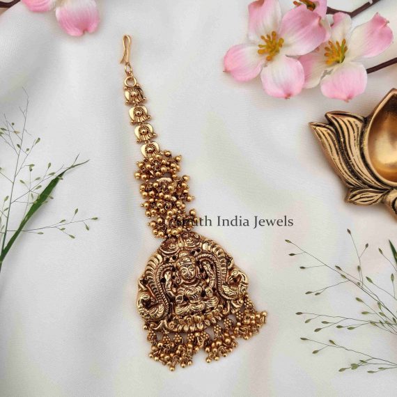 Antique Lakshmi Motifs Maang Tikka With Golden Beads