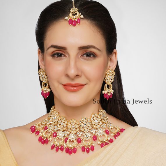 Gorgeous Pink Stones Handcrafted Kundan Brass Necklace Set With Tika