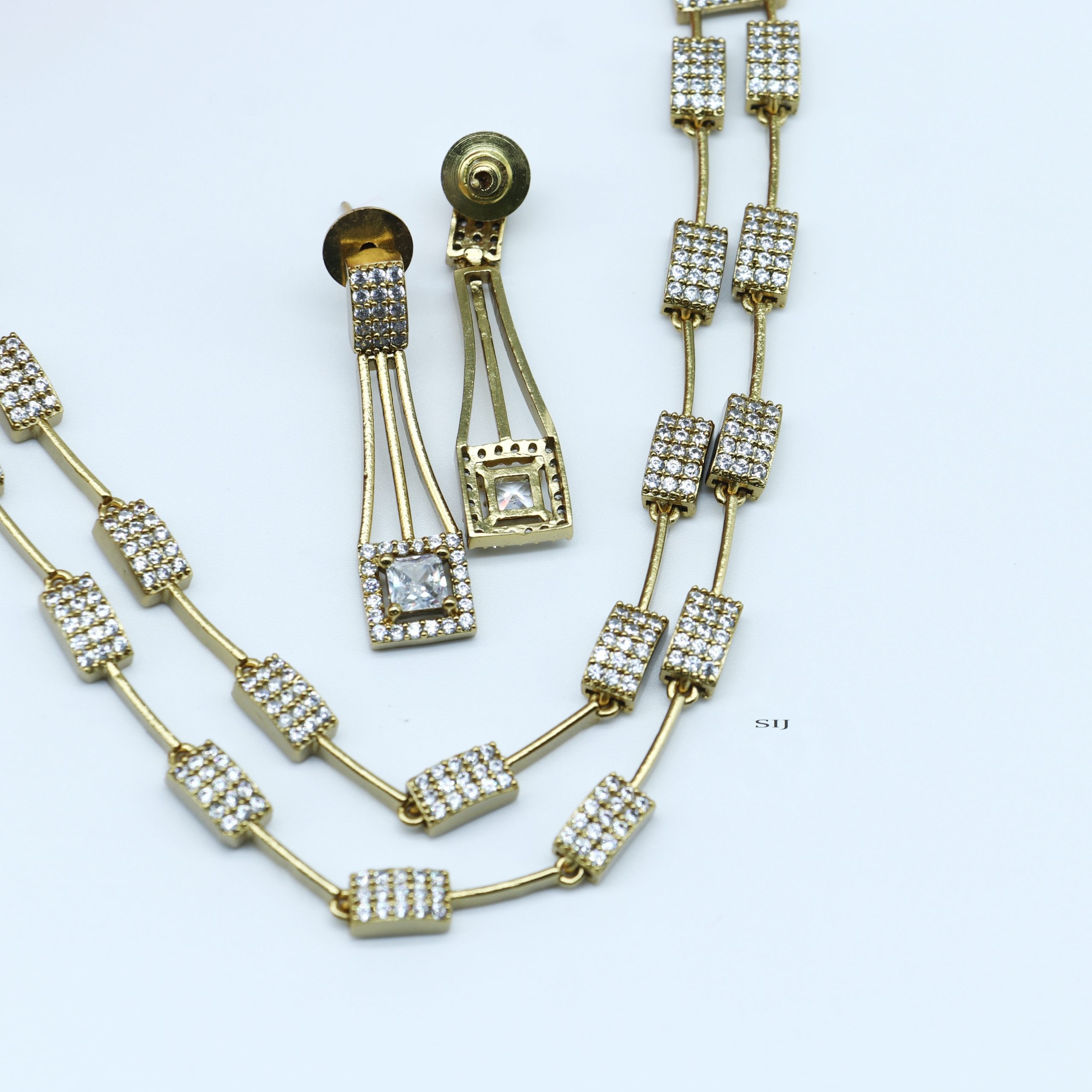 AD Stone Ezhil Studded Gold Polish Necklace