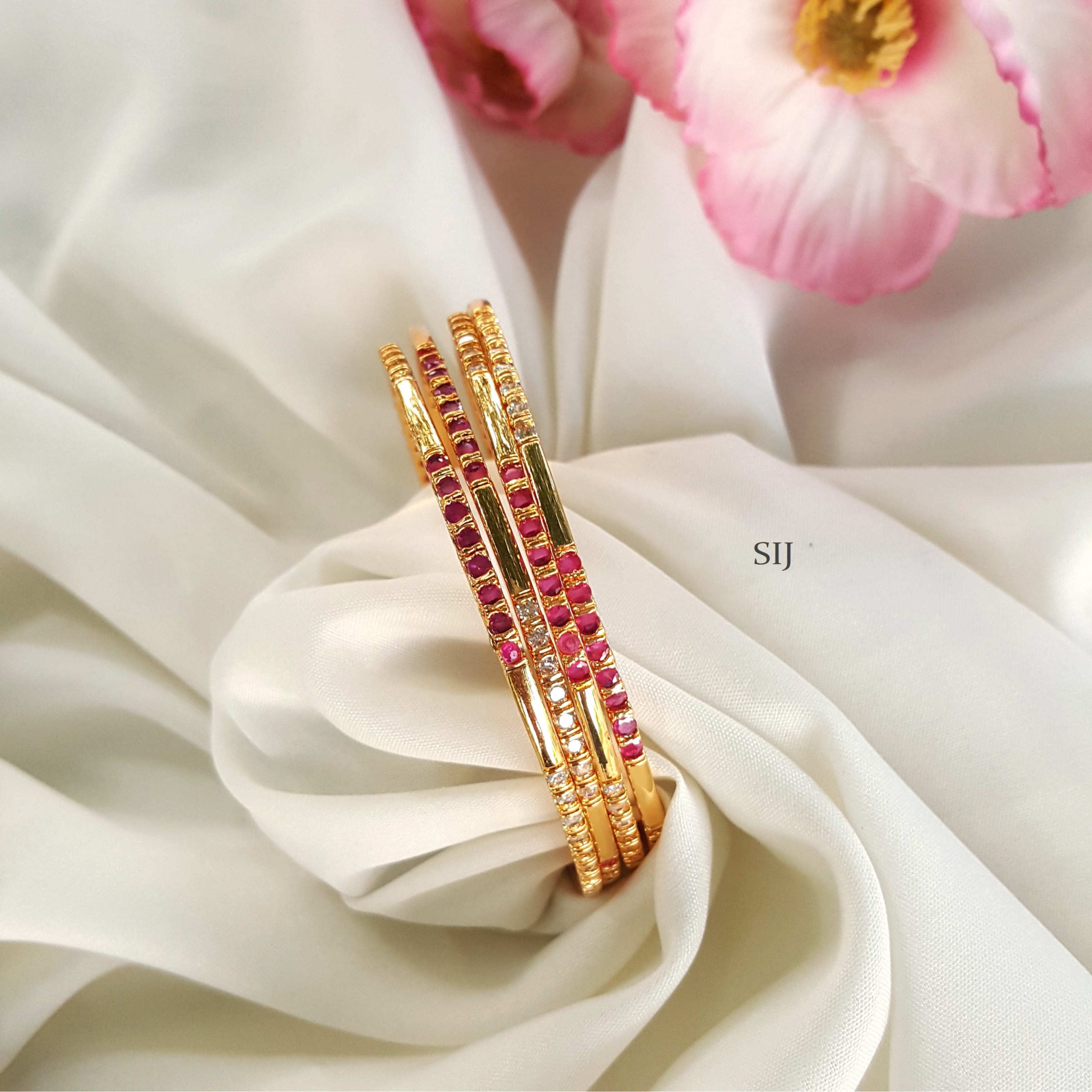 Adorable Gold Alike Ruby And White Stones Bangles