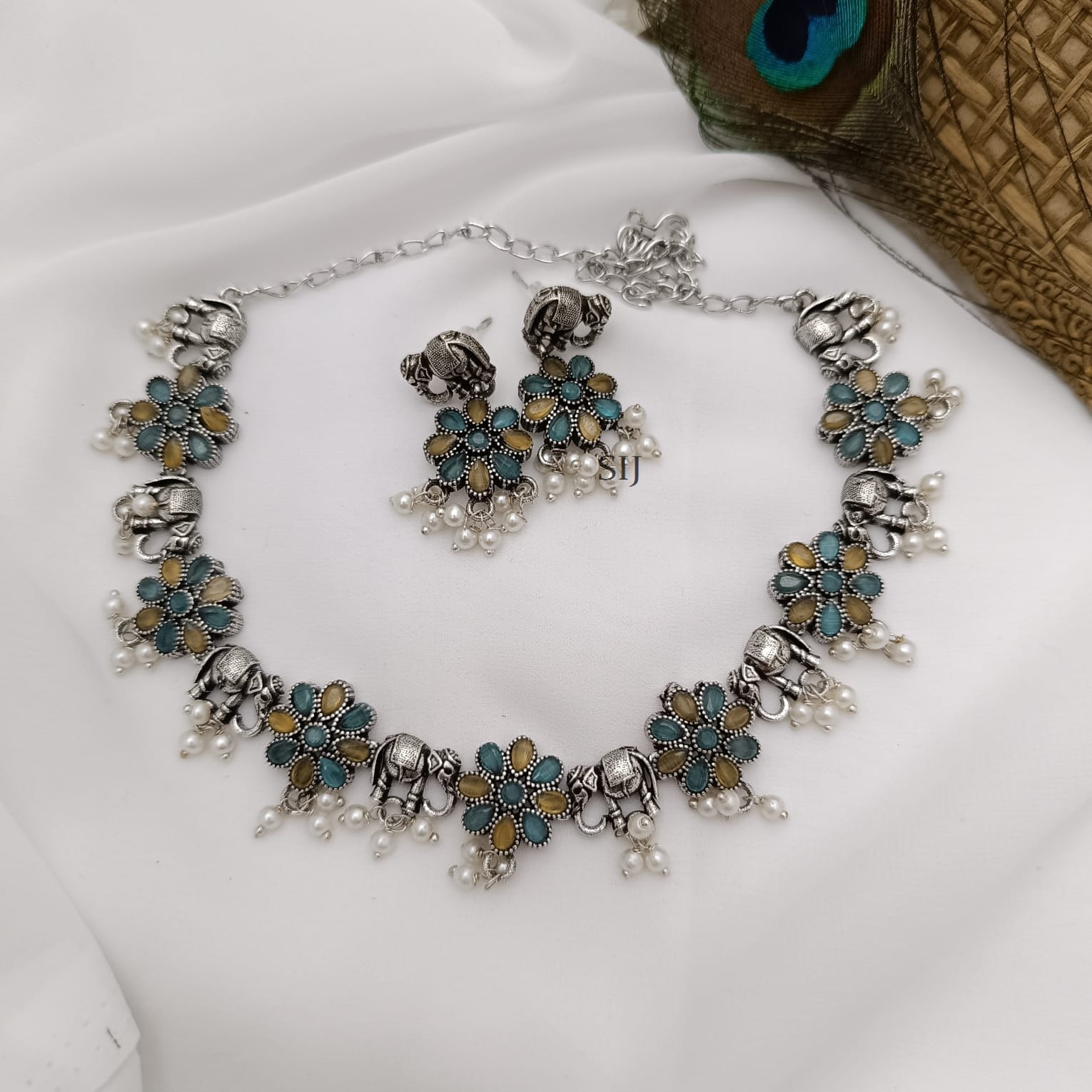 Elegant Blue And Yellow Elephant Design Necklace