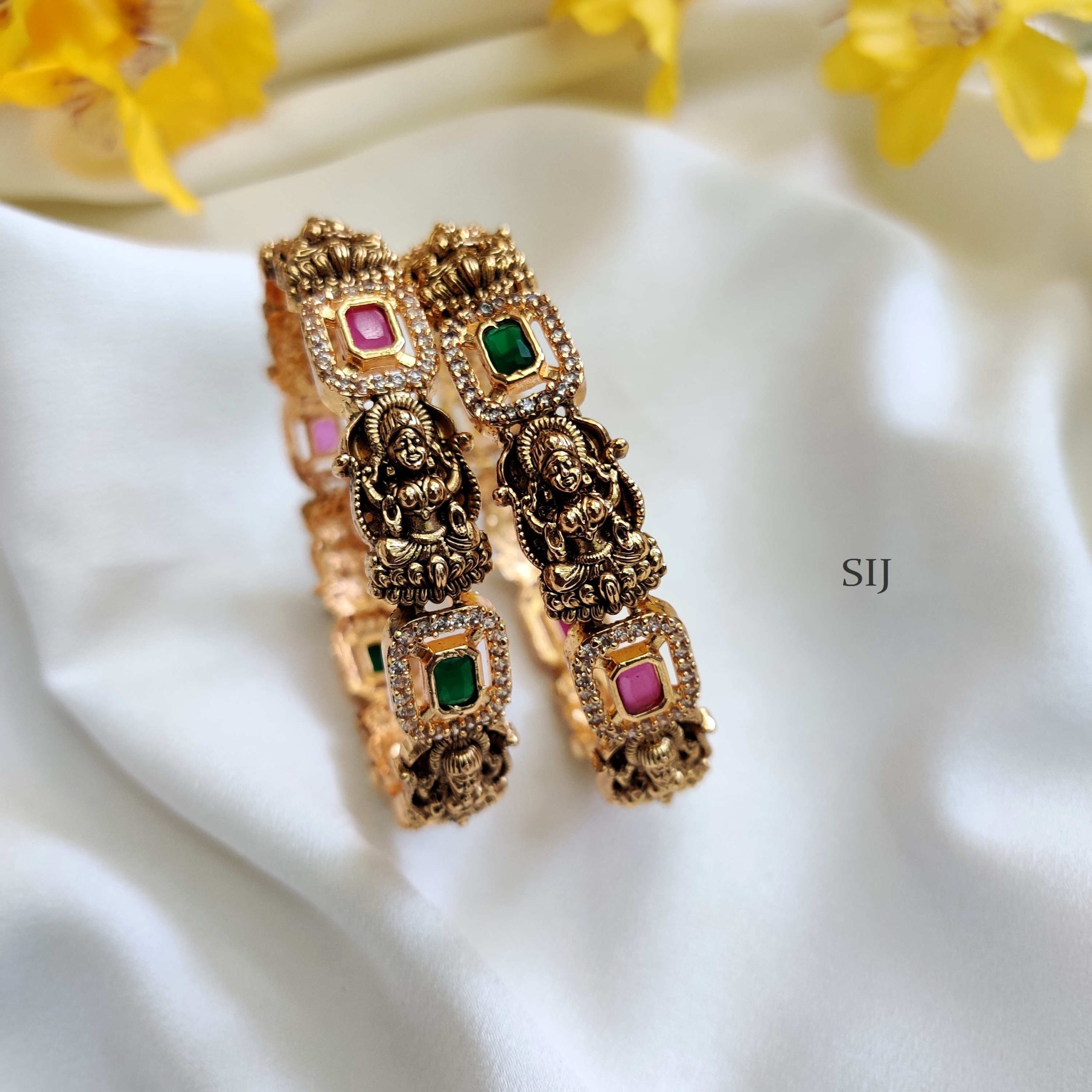 Vintage Touch And Minutely Crafted Lakshmi Design Bangles