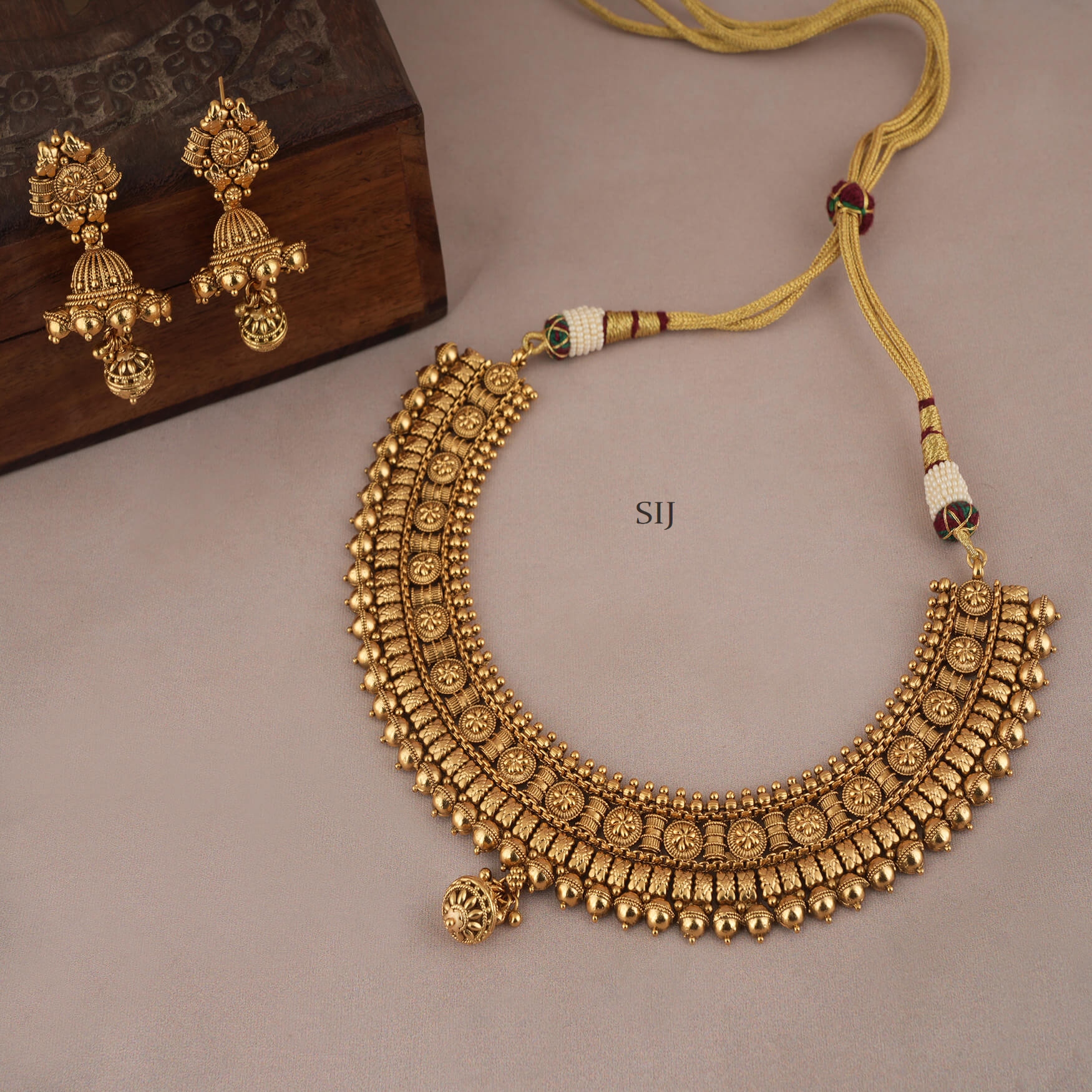 Amazing Gold Finish Necklace with Jhumkas
