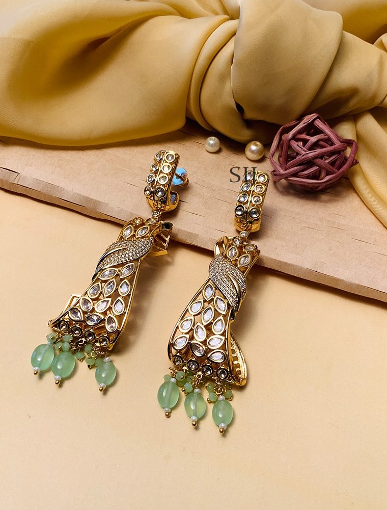 Shimmering Pista Green Pachi Kundan Earrings