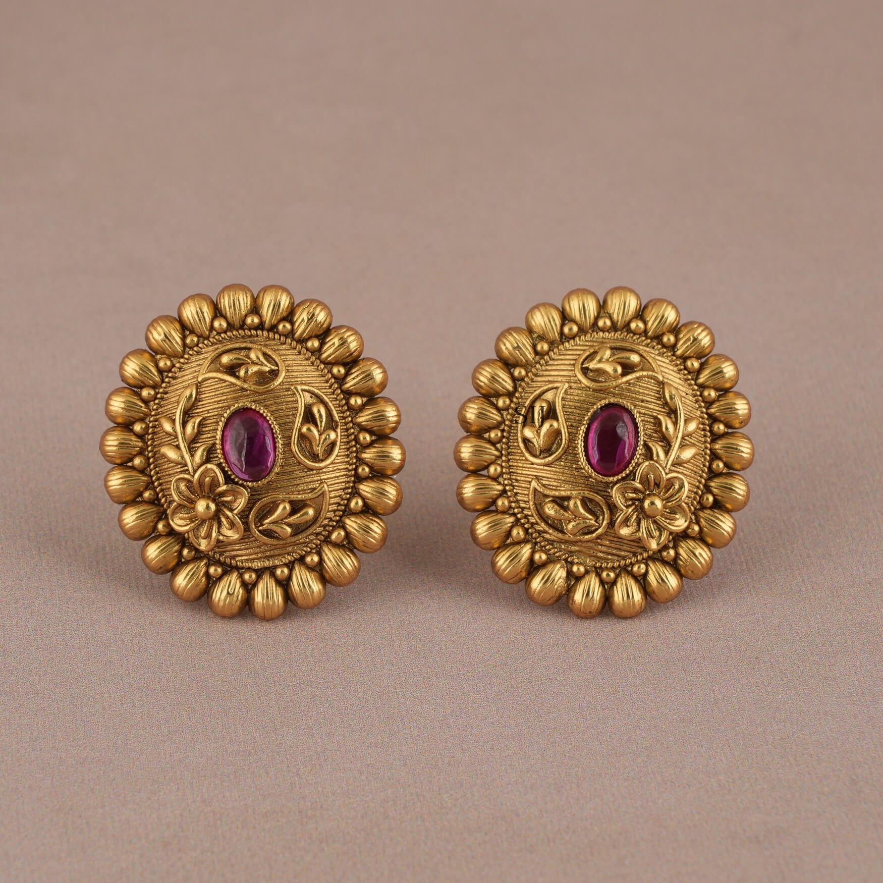 Stunning Gold Floral Oval Shaped Ruby Stone Studs
