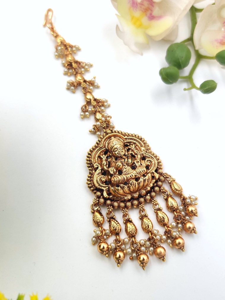 Stunning Lakshmi Maang Tikka