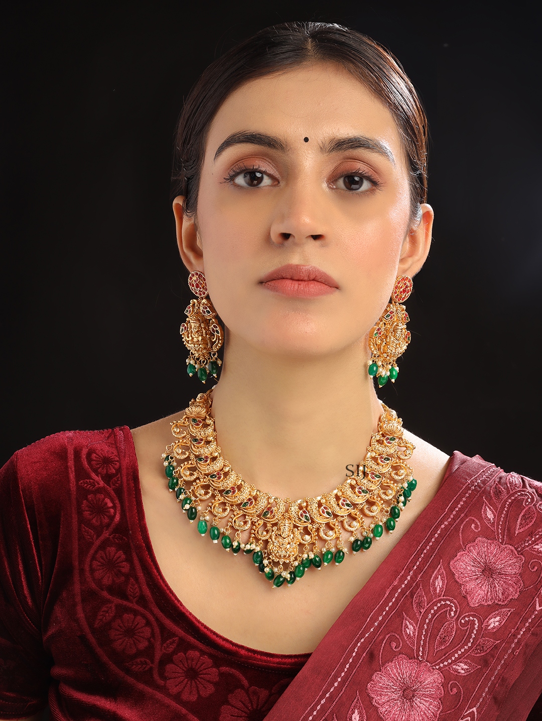 Attractive Maha Lakshmi Peacock Necklace Set with Green Beads