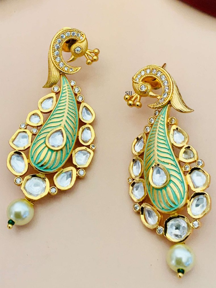 Matte Finish Kundan Peacock Design Earrings with White Stone