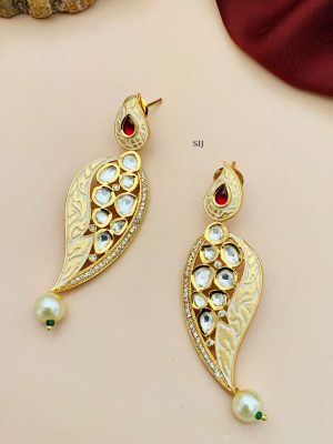 Gold Finish Yellow Earrings with Kundan with Red Stone