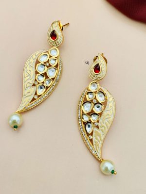 Gold Finish Yellow Earrings with Kundan with Red Stone