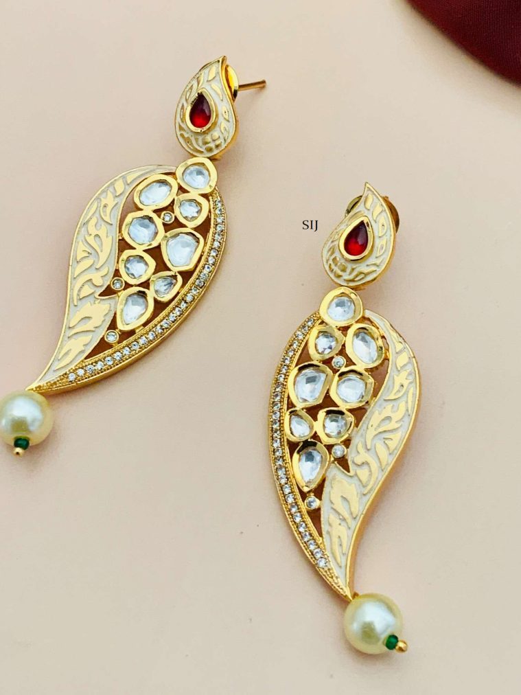 Gold Finish Yellow Earrings with Kundan with Red Stone