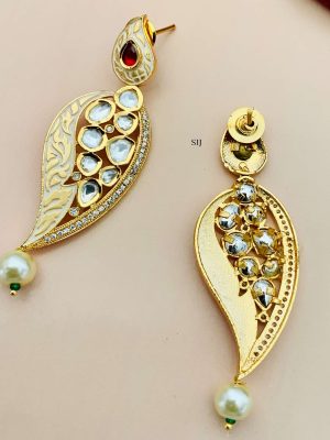 Gold Finish Yellow Earrings with Kundan with Red Stone