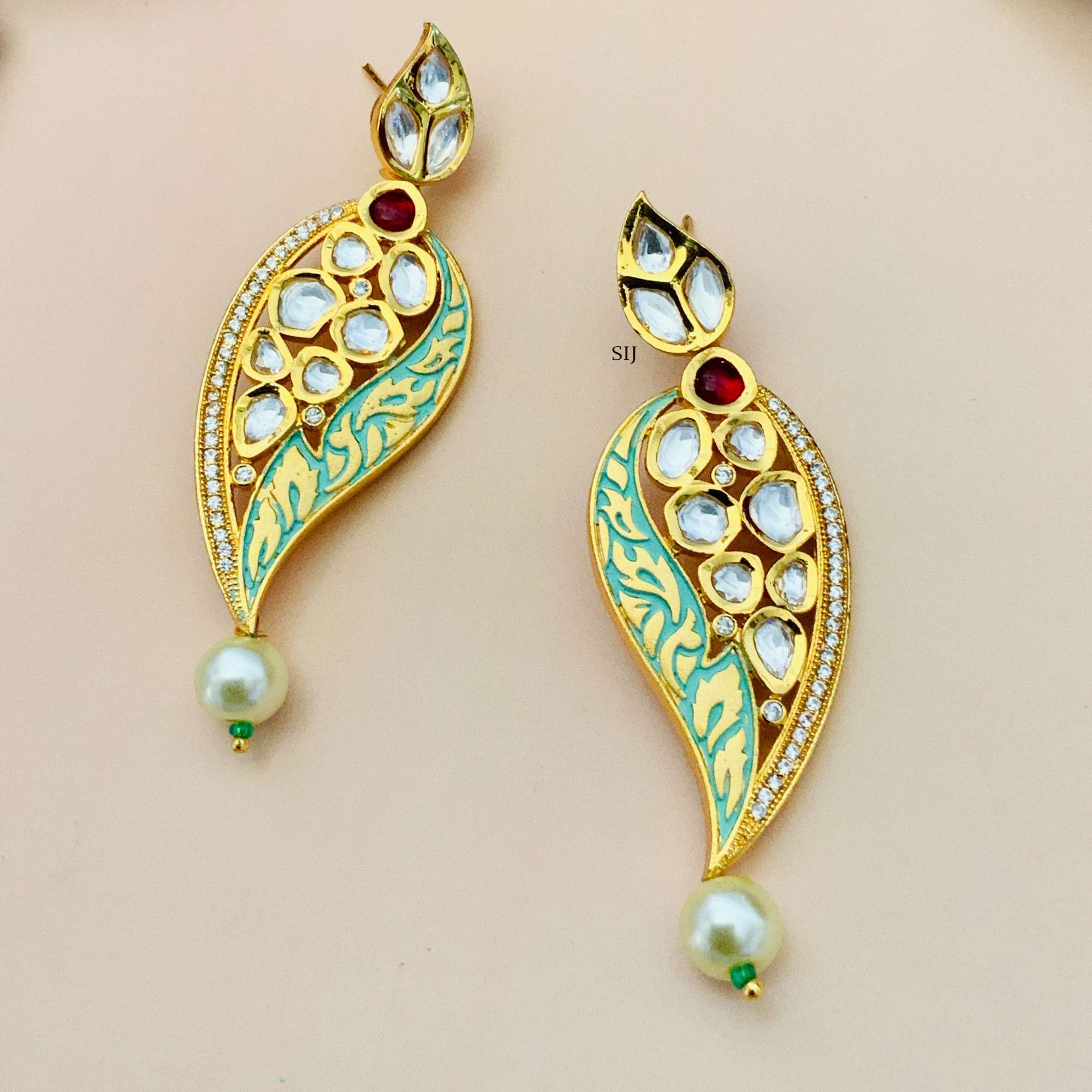 Matte Finish Leaf Design Kundan Earrings with Red Stone