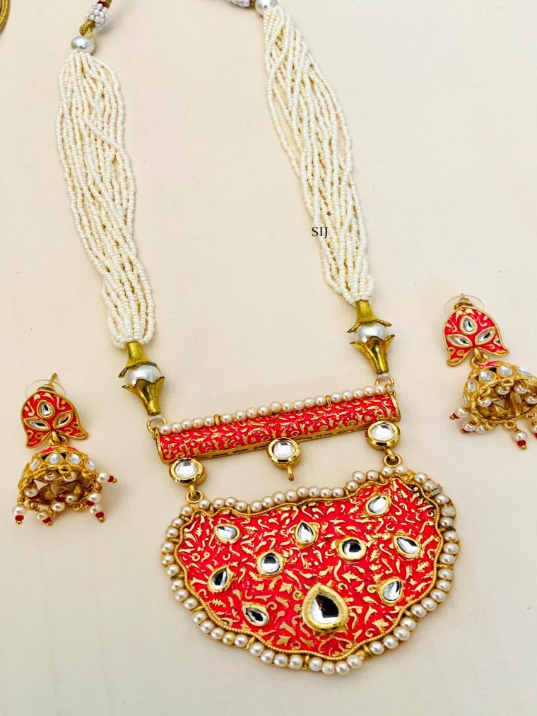 Multi Layers Pearl Beaded Haram with Kundan Studded Orange Pendant