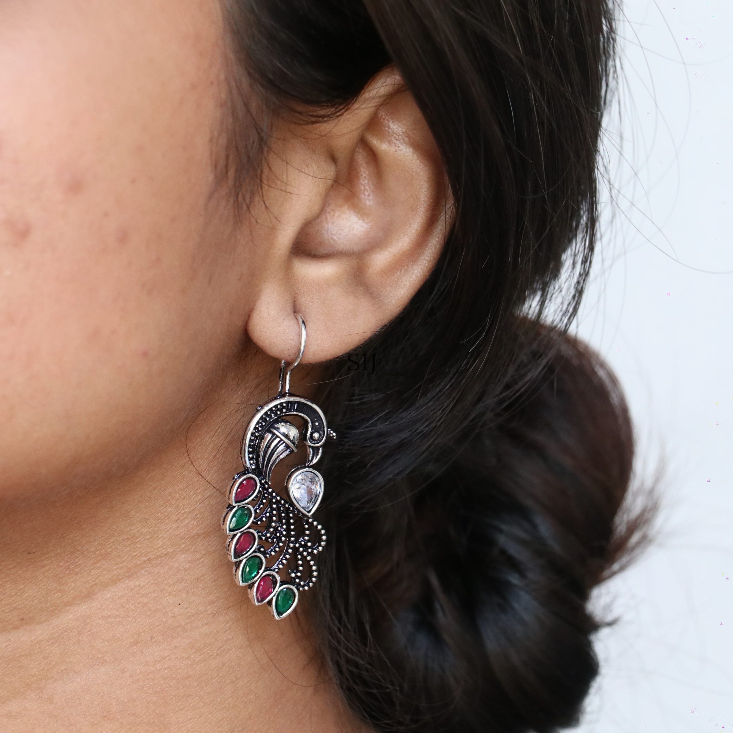 Artificial Peacock Design German Silver Earrings