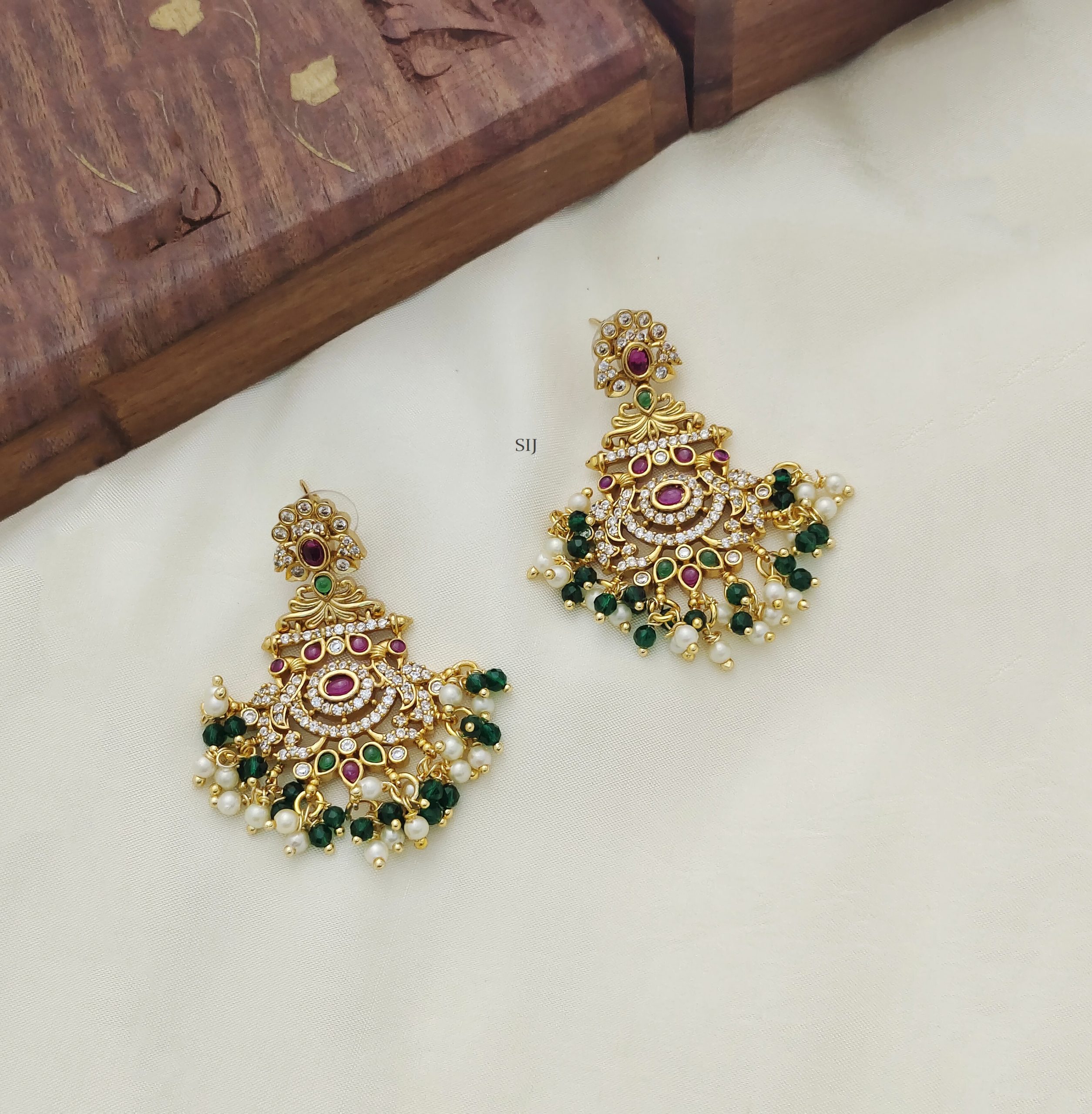 Imitation Kemp Peacock Chandbali Earrings with Green Beads