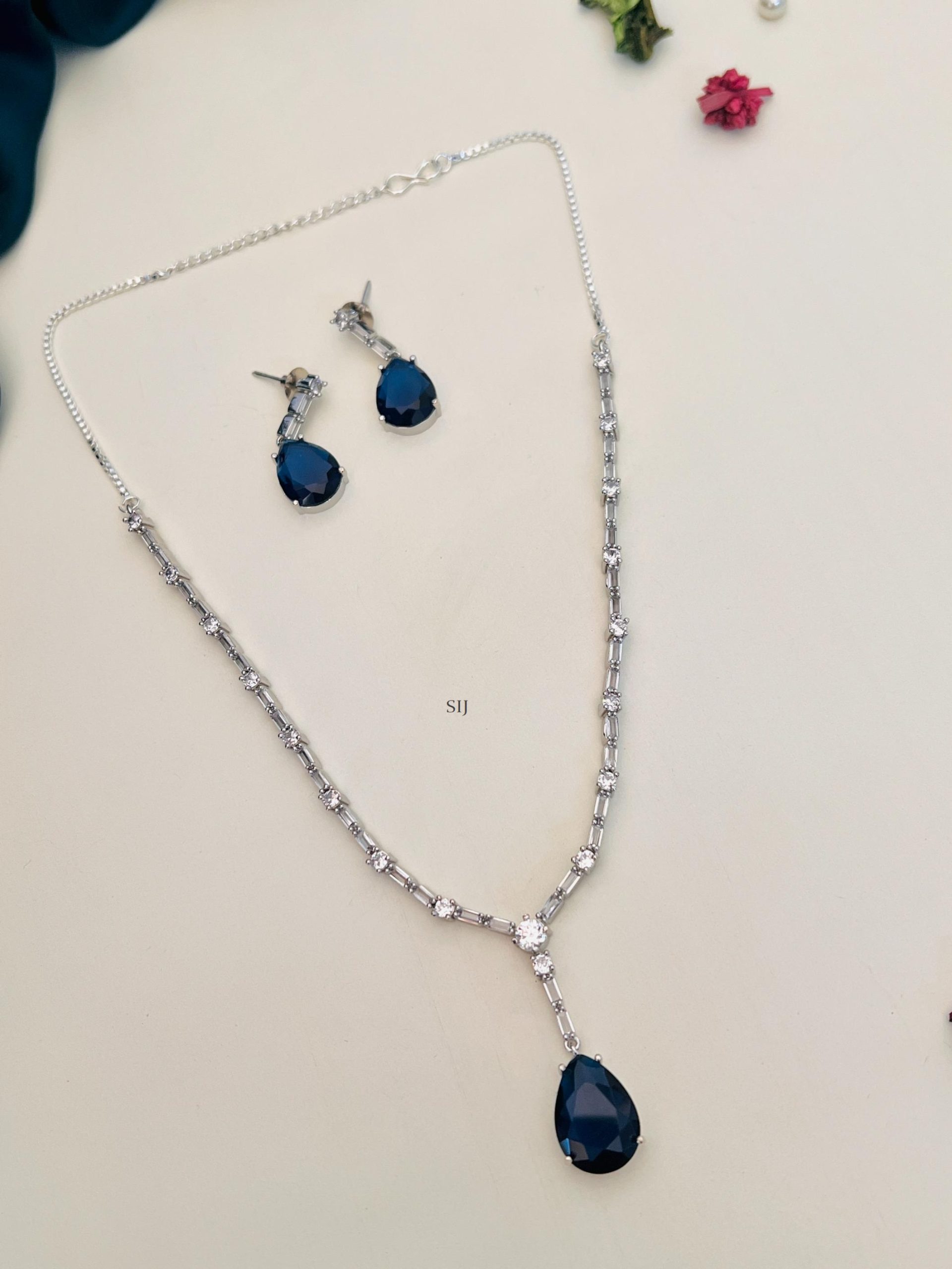 Silver Plated Single Line AD Stones Chain with Blue Stone Pendant