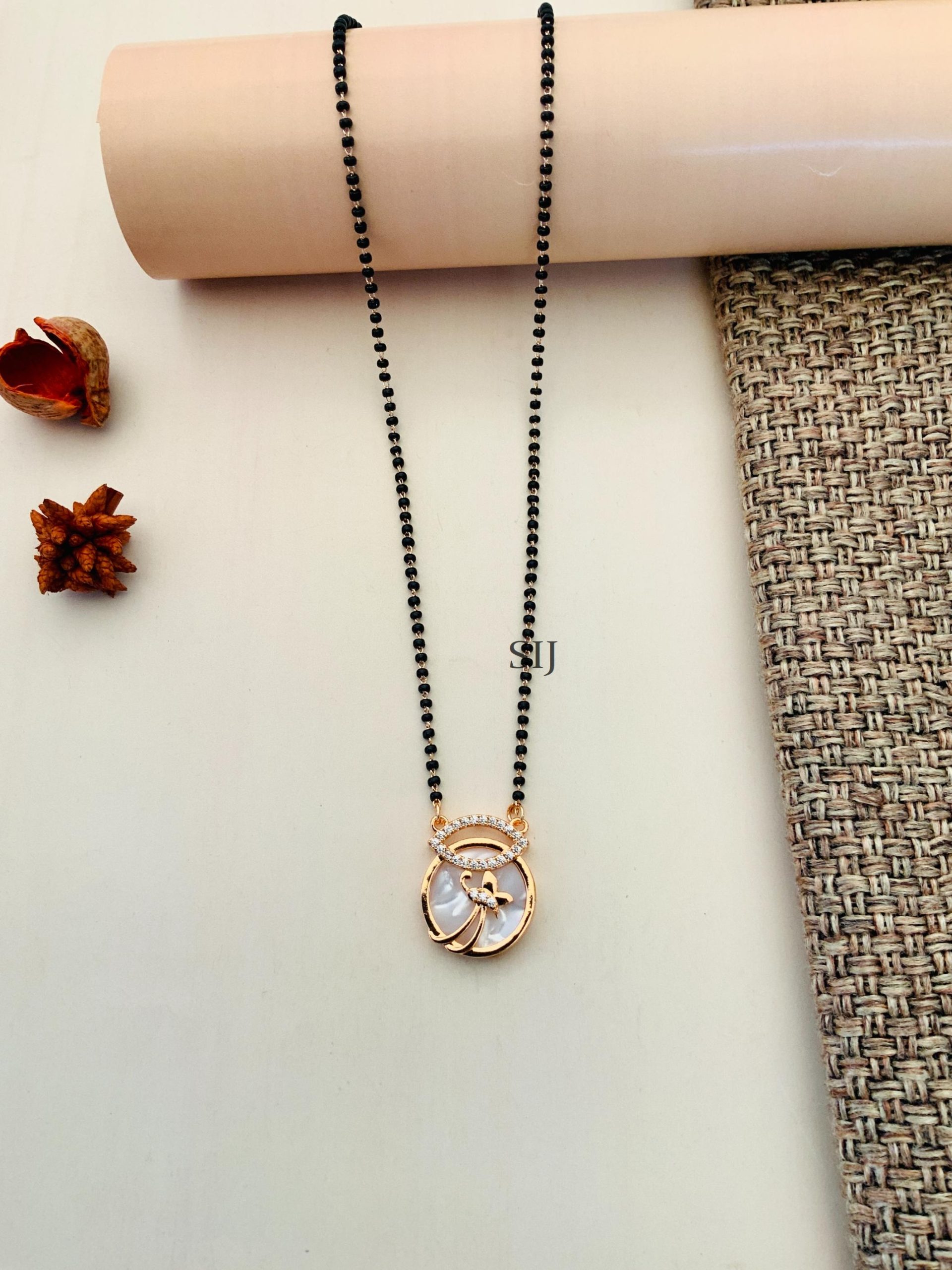 Artificial RoseGold Plated Mother Pearl Solitaire Diamond Mangalsutra ...