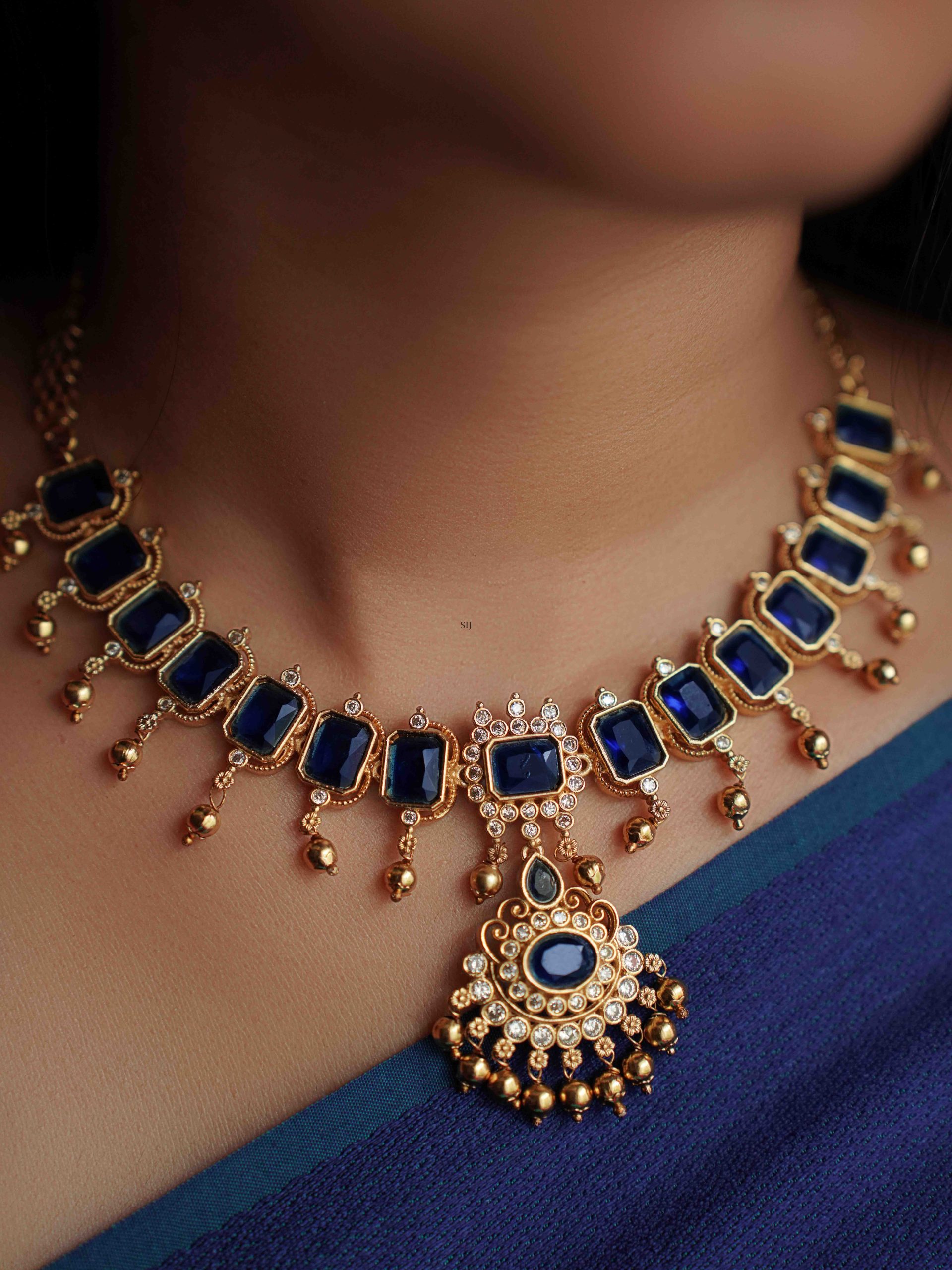 Gold Finish Blue Stone Necklace