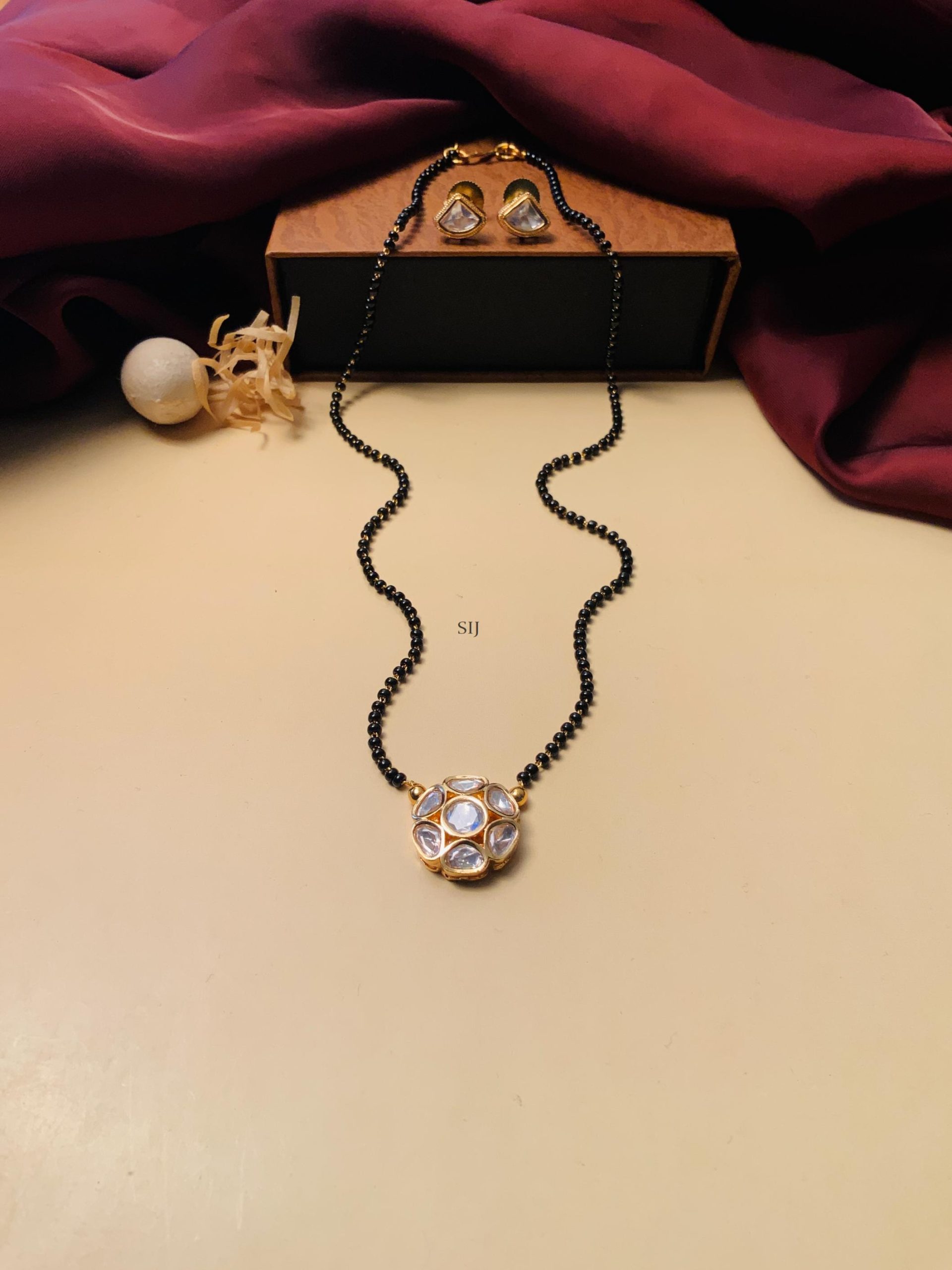 Gold Finish Kundan Polki Diamond Mangalsutra & With Pair of Earrings