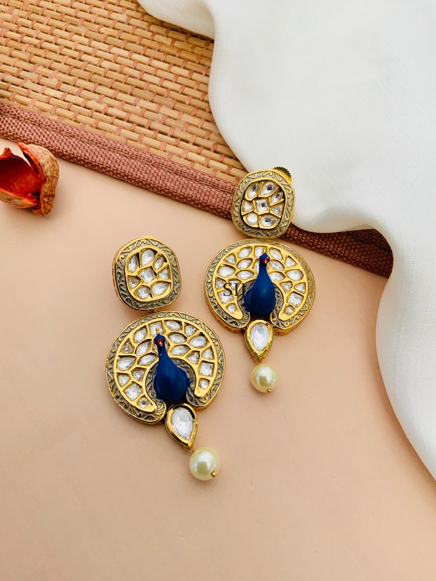 Peacock Engraved Kundan Stones Earrings With Pearl Hanging