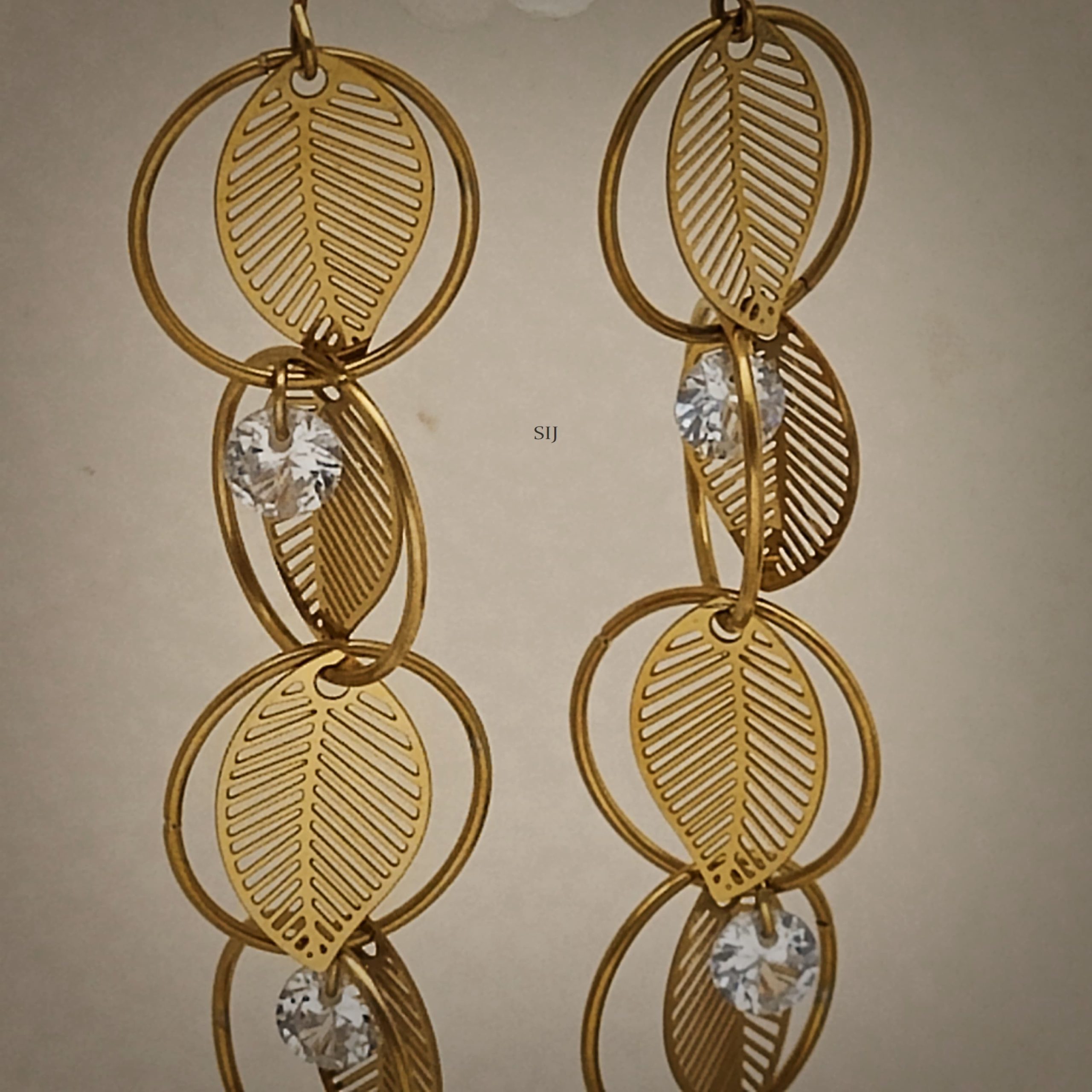 Gold Plated Circular Dangler Earrings with Leaf Design