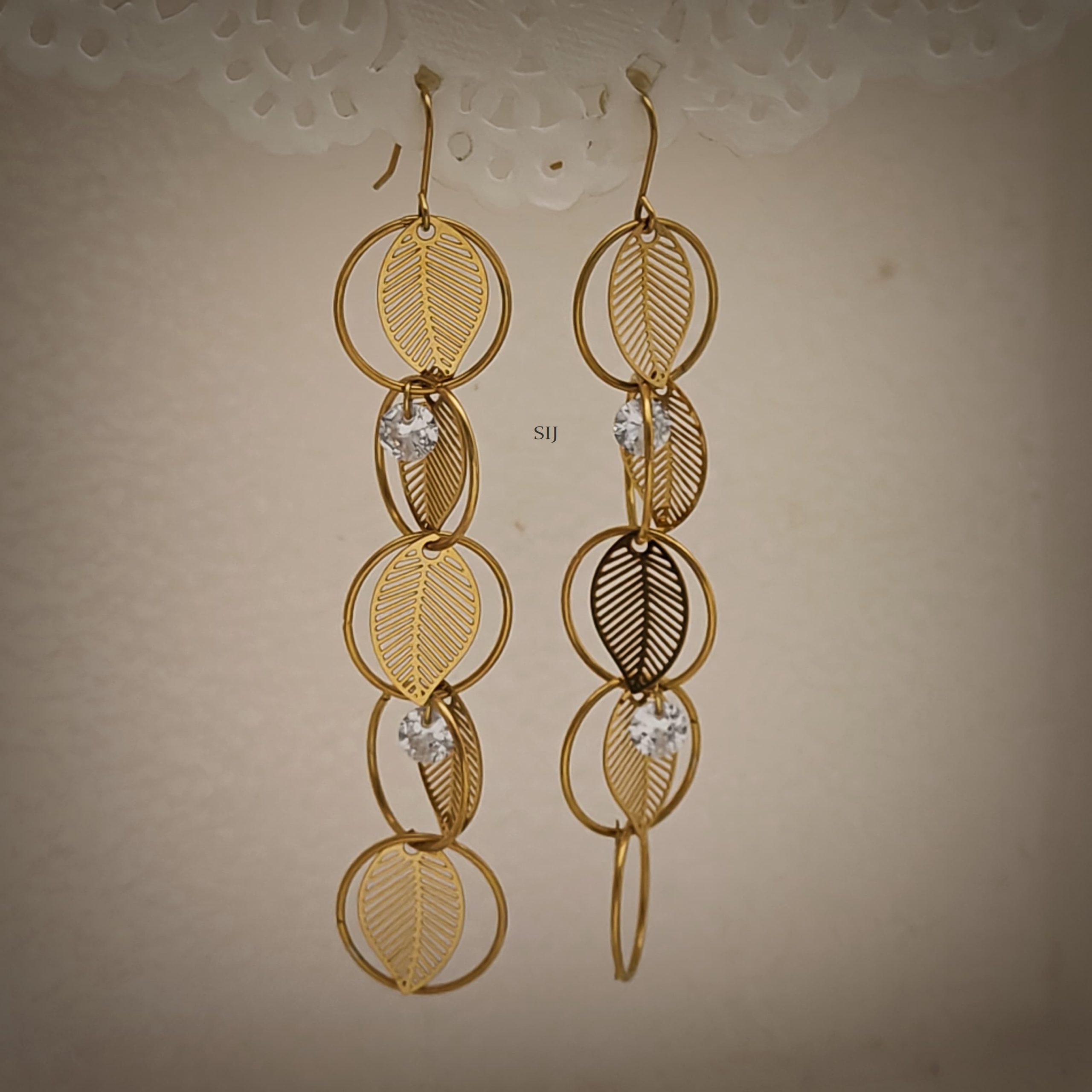 Gold Plated Circular Dangler Earrings with Leaf Design
