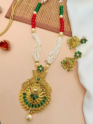 Artificial Pearl And Green Kundan Necklace With Jhumkas