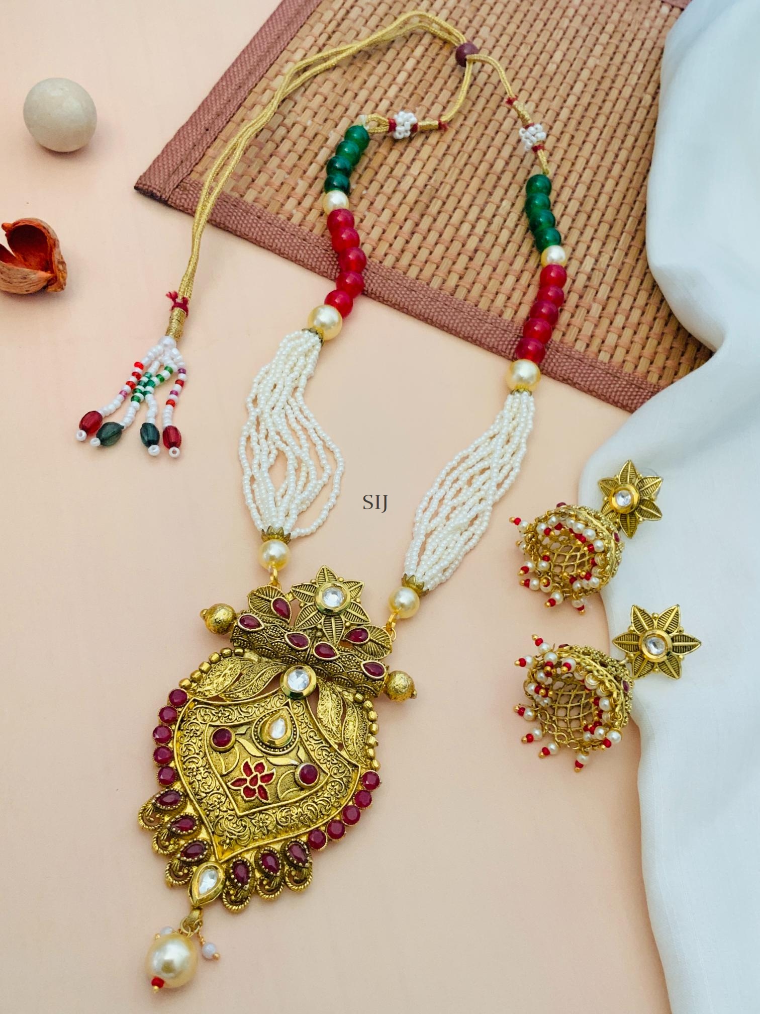 Gold Finish Red Kundan Pearl Necklace With Star Jhumkas