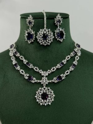 Silver Plated Flower Design Blue Stone AD Necklace With Earrings And Maang Tikka