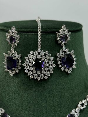 Silver Plated Flower Design Blue Stone AD Necklace With Earrings And Maang Tikka