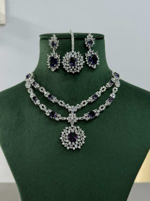 Silver Plated Flower Design Blue Stone AD Necklace With Earrings And Maang Tikka