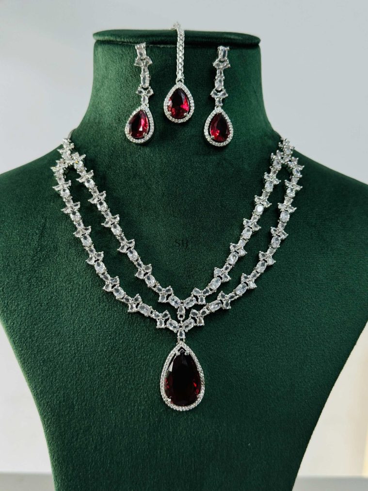 Silver Plated Red Stone AD Necklace With Earrings And Maang Tikka