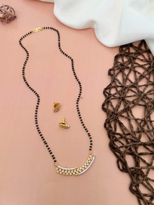 Gold Finish Black Beads Mangalsutra with AD Stones Pendant