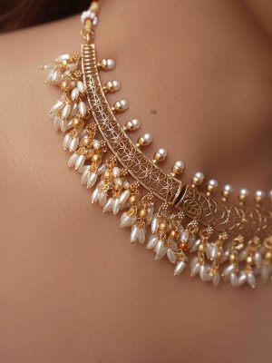 Gold Finish Kante Design Choker with Rice Pearl Guttapusalu