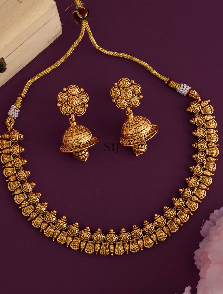 Gold Finish Flower Design Necklace With Matching Jhumkas