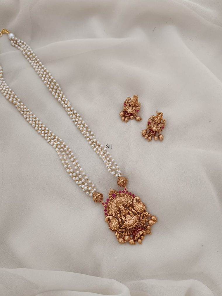 Ruby Stones Studded In Lakshmi Pendant Pearl Long Haram