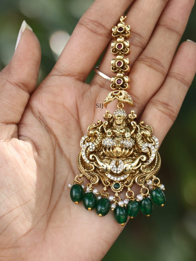 Gold Finish Lakshmi Devi Tikka with Green Beads Hangings