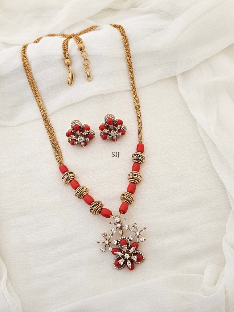 Gold Finish Coral Beads Mala with CZ Stone Flower Pendant